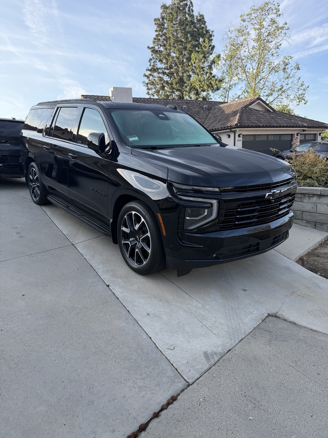 Velare Chauffeur black Chevrolet Suburban